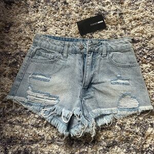 FashionNova ‘Adelia Distressed Denim Shorts’